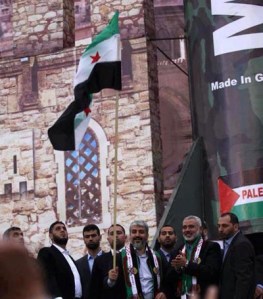 Khaled Meshal dan para elit Hamas kibarkan bendera pro-pemberontak.